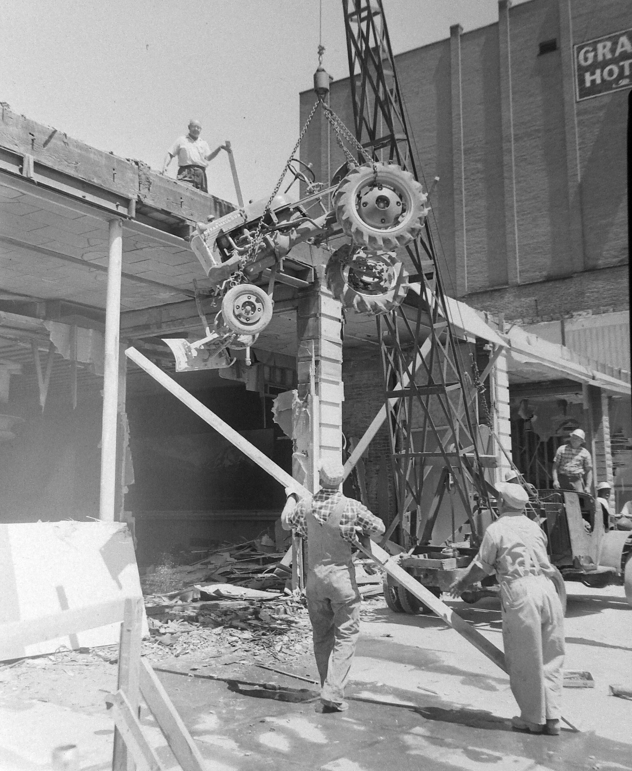 Eagles Building tractor falls from roof Jun 1960